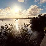 Tangerine Sunsets Solo Bay